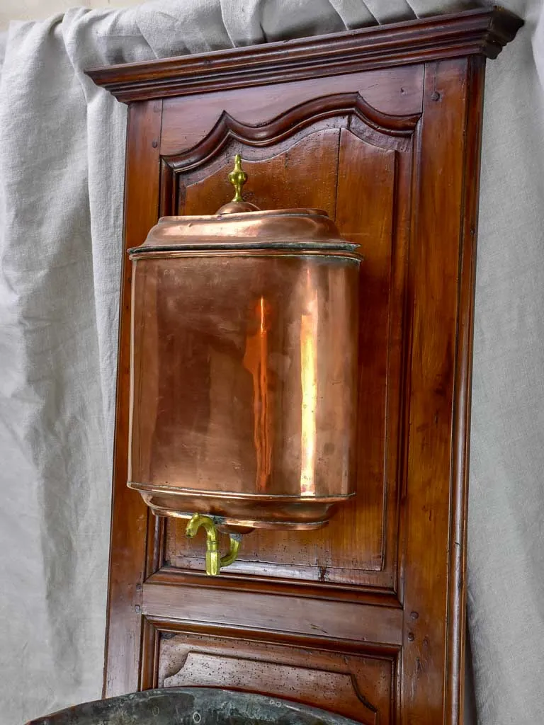 18th Century mounted copper basin on walnut panel