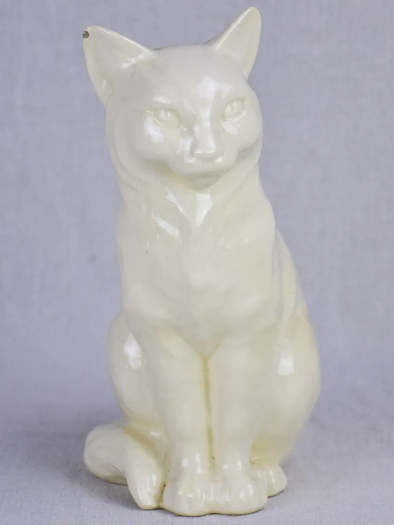 Early 20th Century ornament of a white cat - Sarreguemines faience 9½"