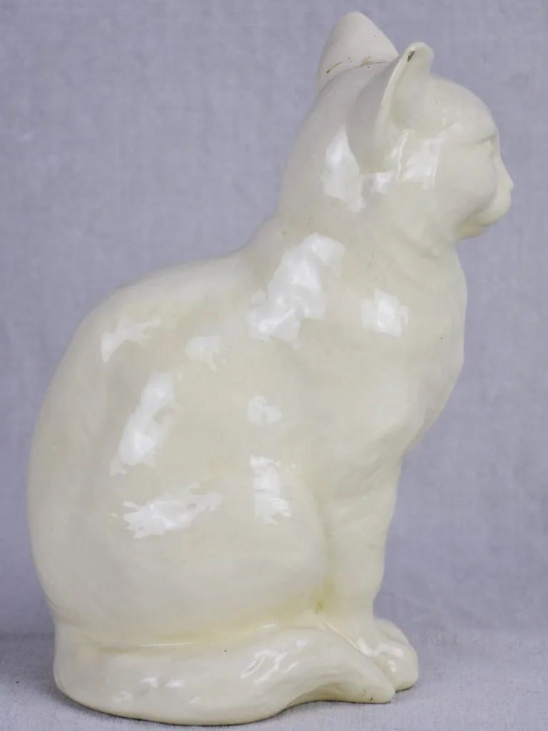 Early 20th Century ornament of a white cat - Sarreguemines faience 9½"