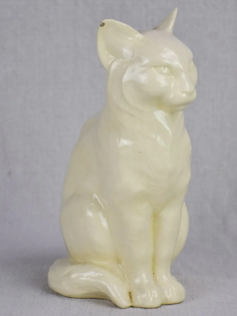 Early 20th Century ornament of a white cat - Sarreguemines faience 9½"