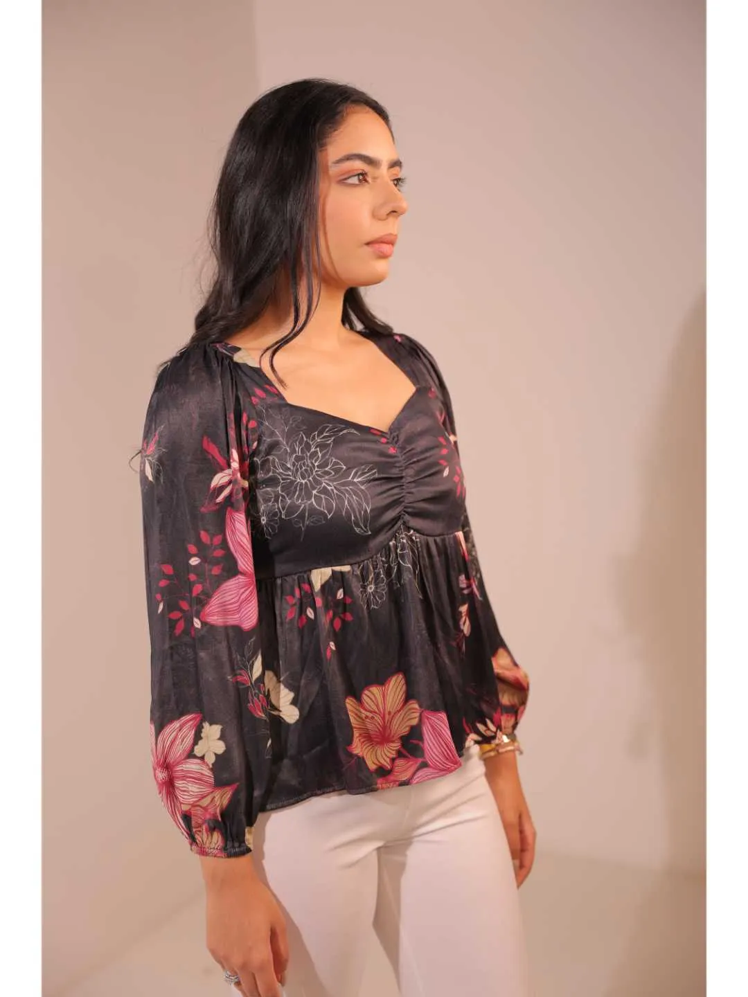 modish viscose royal satin floral printed sweet heart center gathered busted, full puff sleeve, back tie-up top. - Black