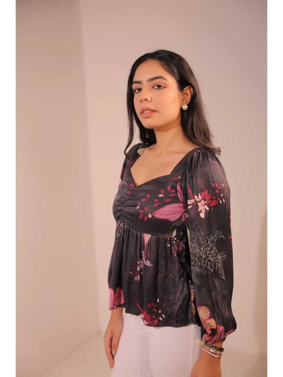 modish viscose royal satin floral printed sweet heart center gathered busted, full puff sleeve, back tie-up top. - Black