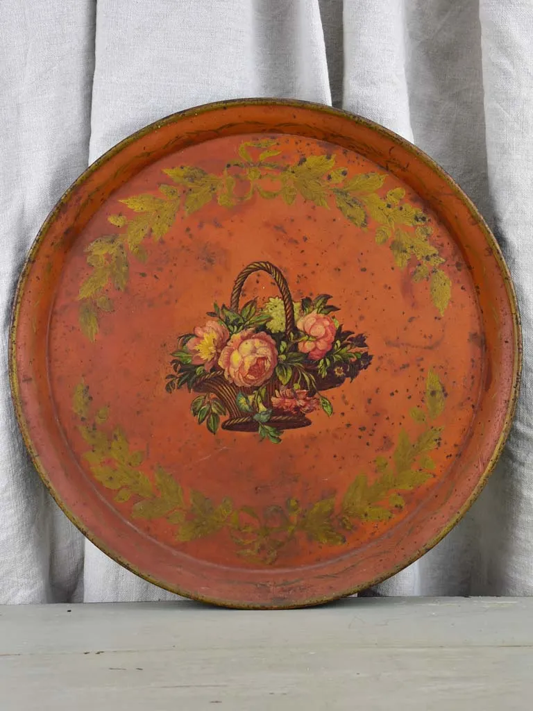 Napoleon III tole tray - round with basket of flowers and oak leaf decoration 17¾"