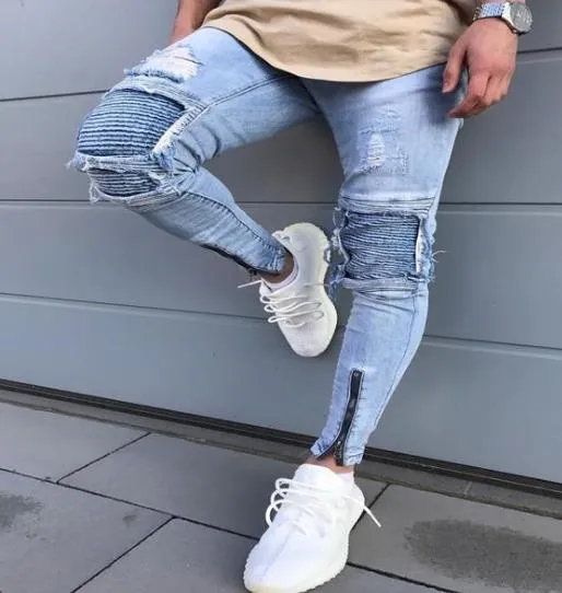 New jeans men's Europe and America motorcycle pants knee pleats broken pants zipper stretch feet pants