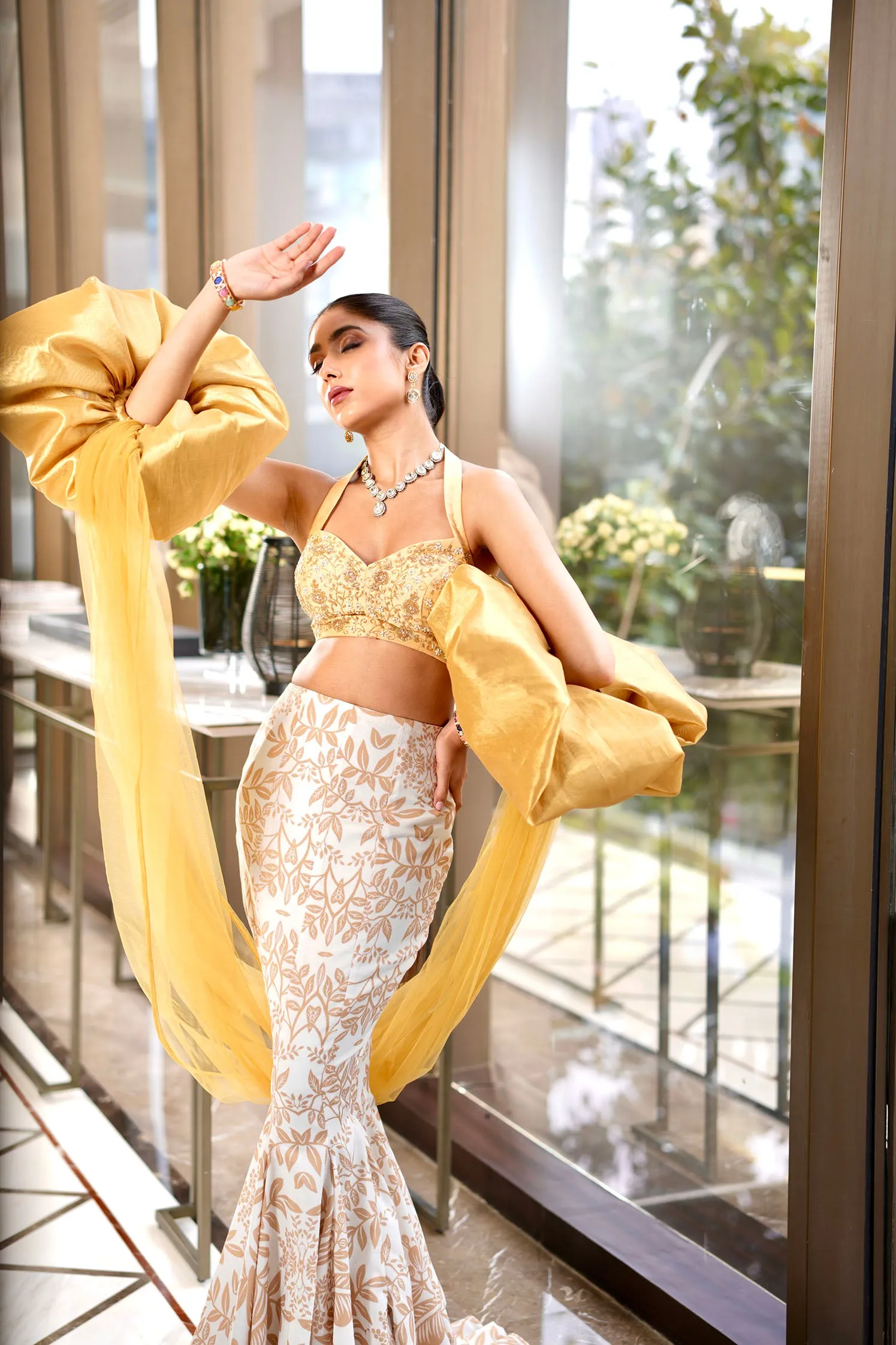 Rashika's Hand embroidered Silk halter neck blouse with Fishtale NISHA Lehenga - Rent