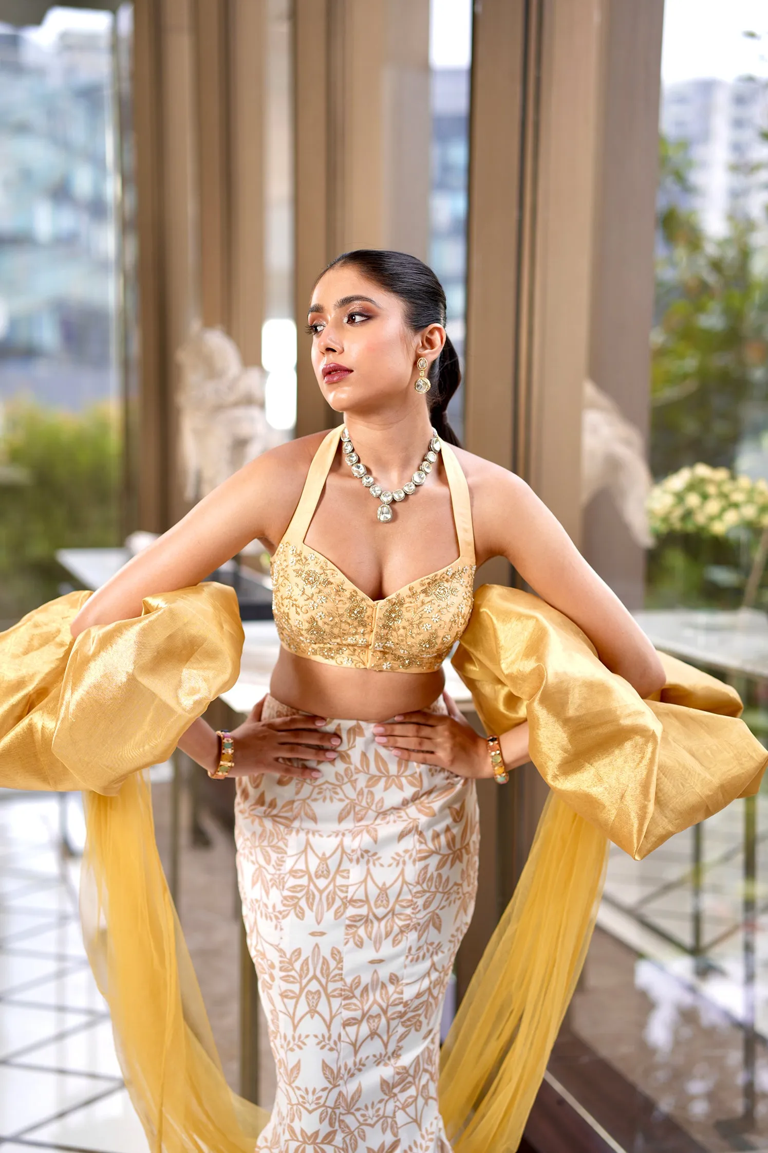 Rashika's Hand embroidered Silk halter neck blouse with Fishtale NISHA Lehenga - Rent